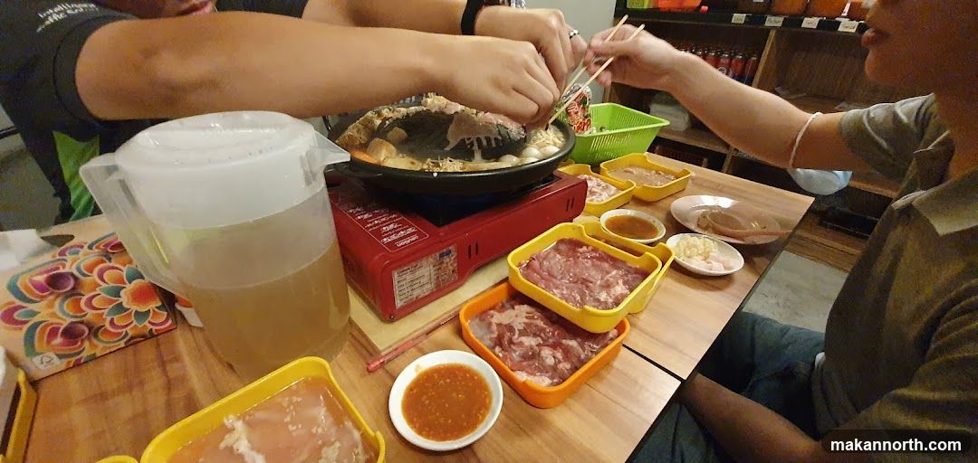 People cooking at a table