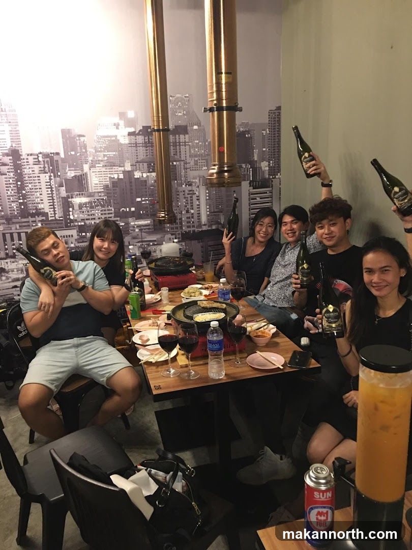 Friends celebrating with drinks at a restaurant