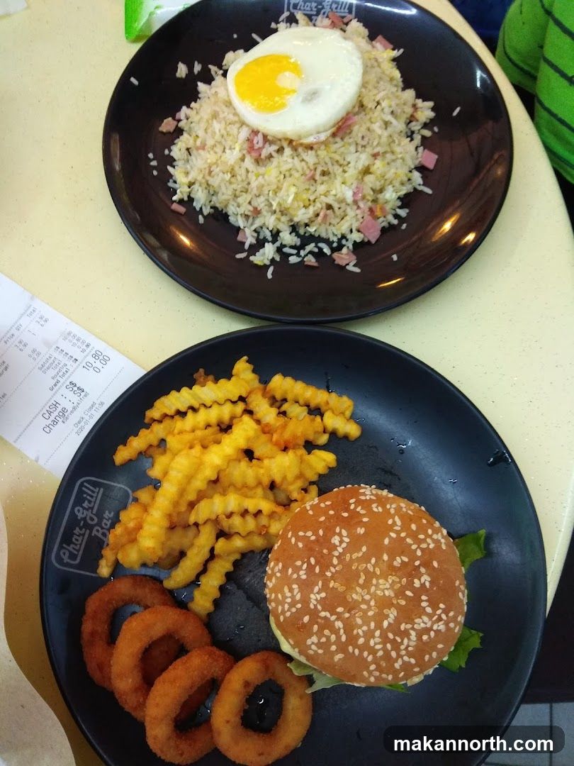 Burger, Fries, Onion Rings, and Fried Rice
