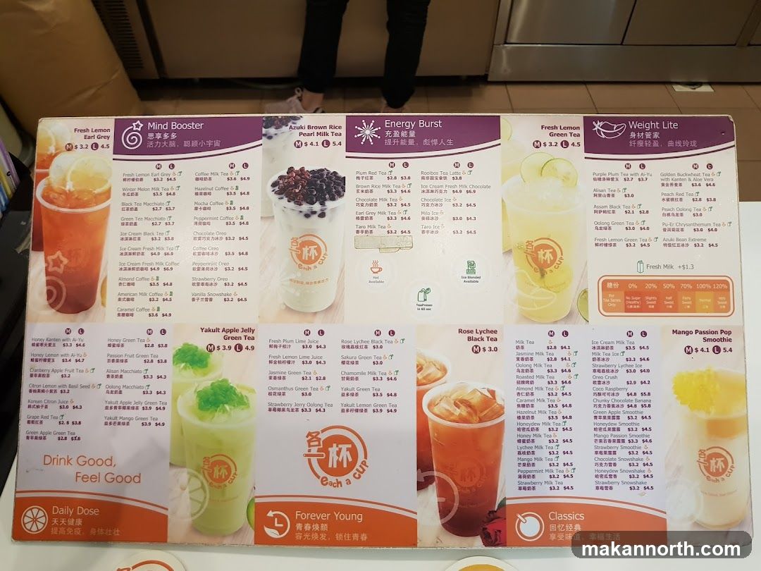 A menu for a bubble tea shop with various categories including Mind Booster, Energy Burst, Weight Lite, and Classics. Each category lists different drinks with their sizes (M, L) and prices. There are also options for sugar levels and a note about fresh milk.