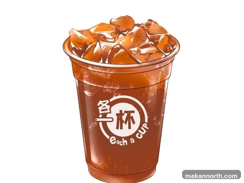A clear plastic cup filled with iced tea and ice cubes. The cup has a white circular logo with Chinese characters and the text "each a cup" below it.