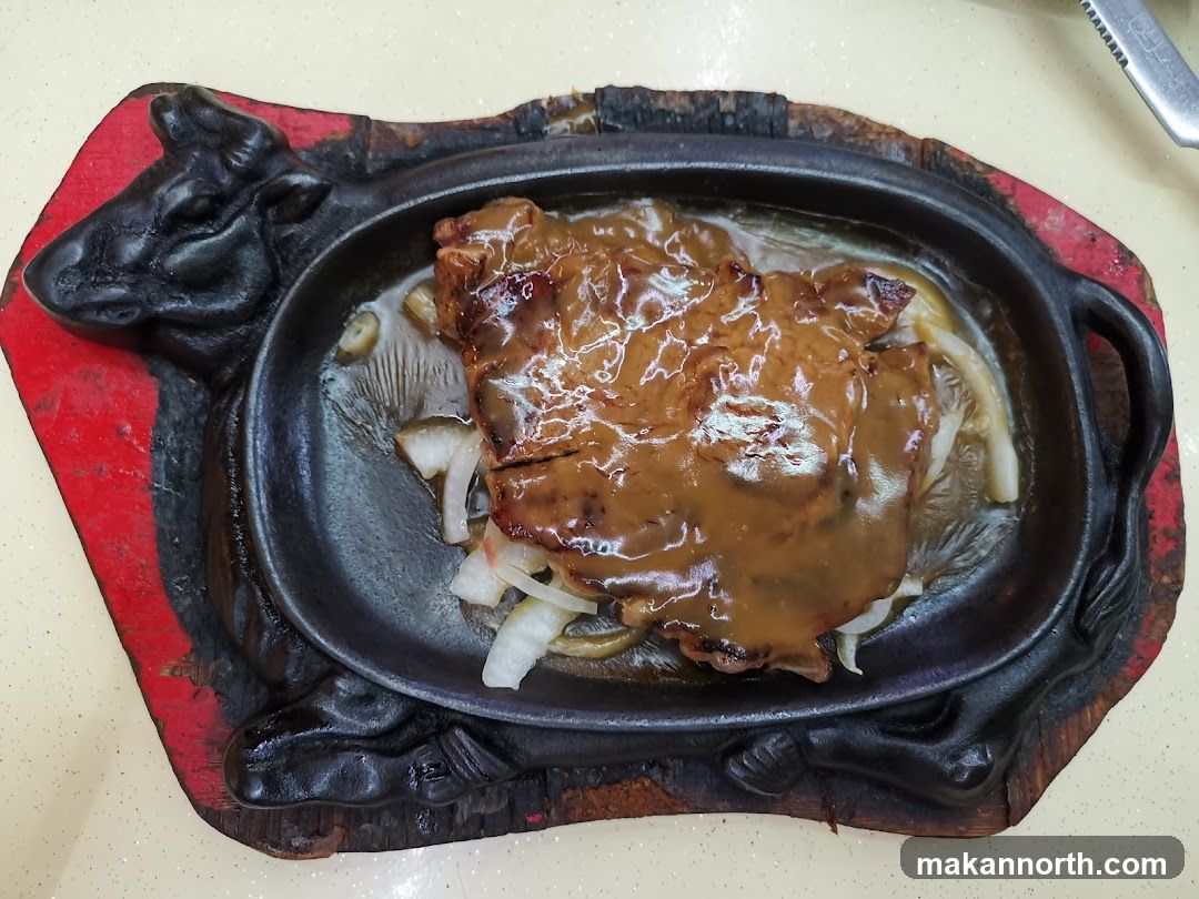 Steak on a Sizzling Platter