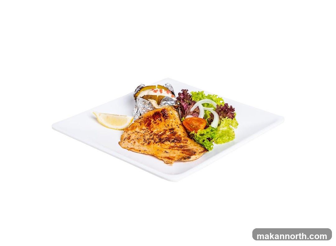 Grilled Salmon with Baked Potato and Salad