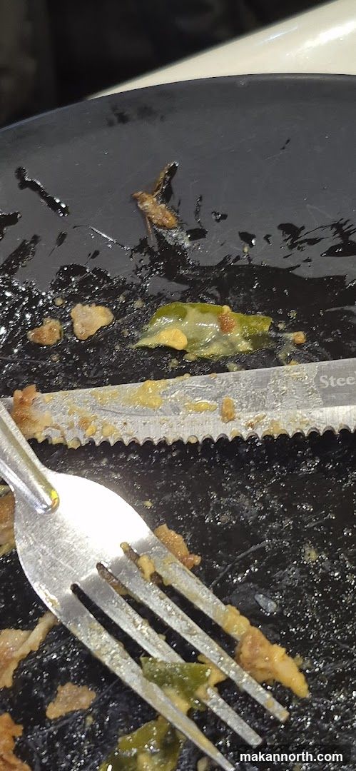 Dirty Plate with Utensils