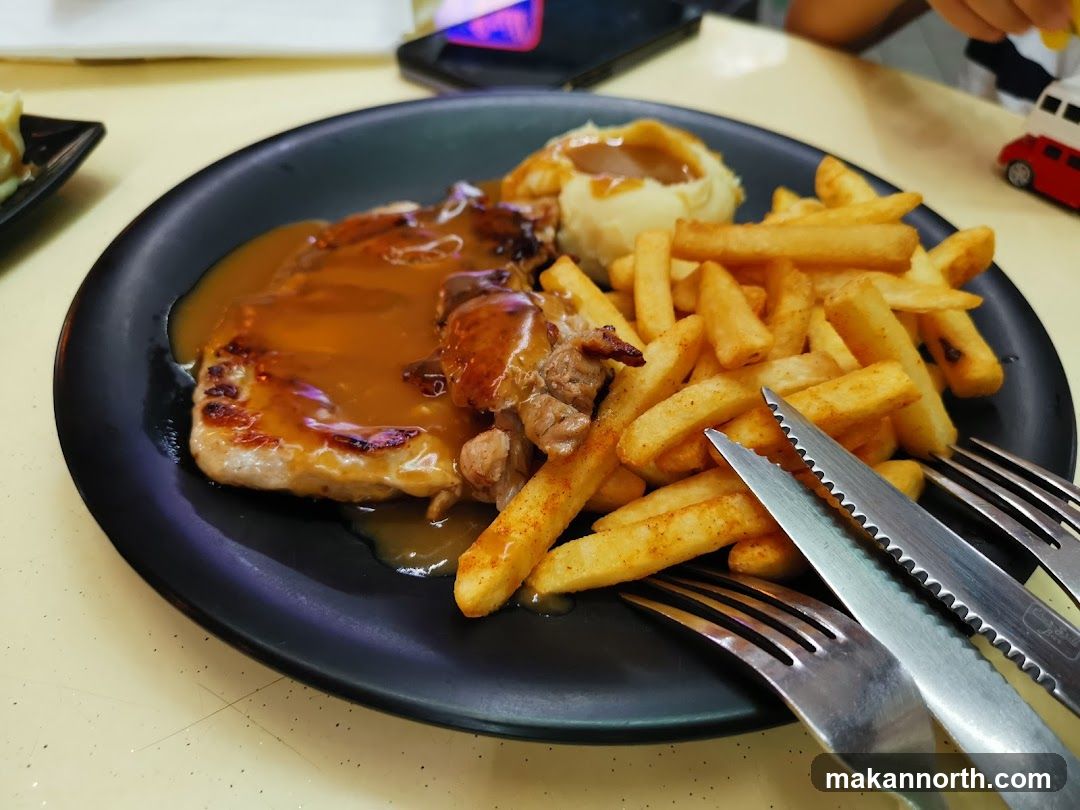 Pork Chop with Fries and Mashed Potatoes