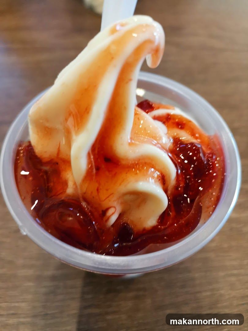 Soft Serve Ice Cream with Strawberry Topping