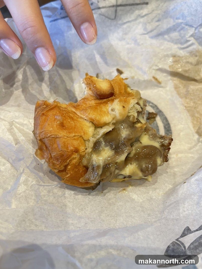 Bitten Croissant Sandwich