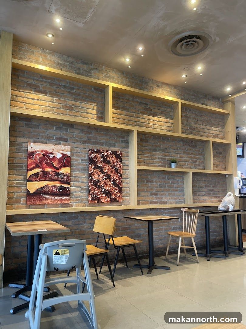 Restaurant Interior with Brick Wall and Artwork