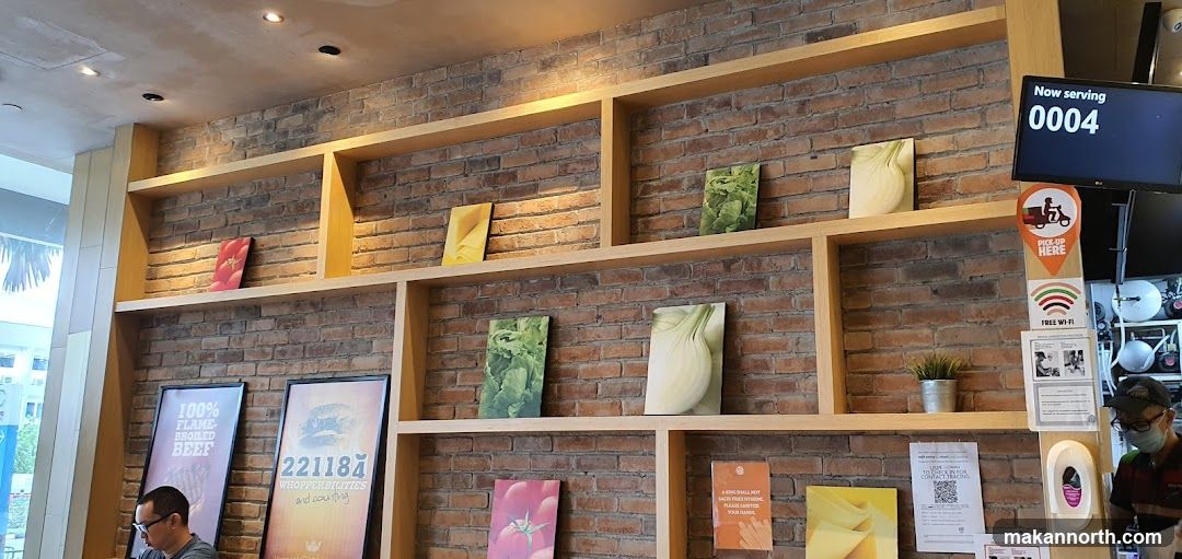 Restaurant Interior with Shelving and Digital Display