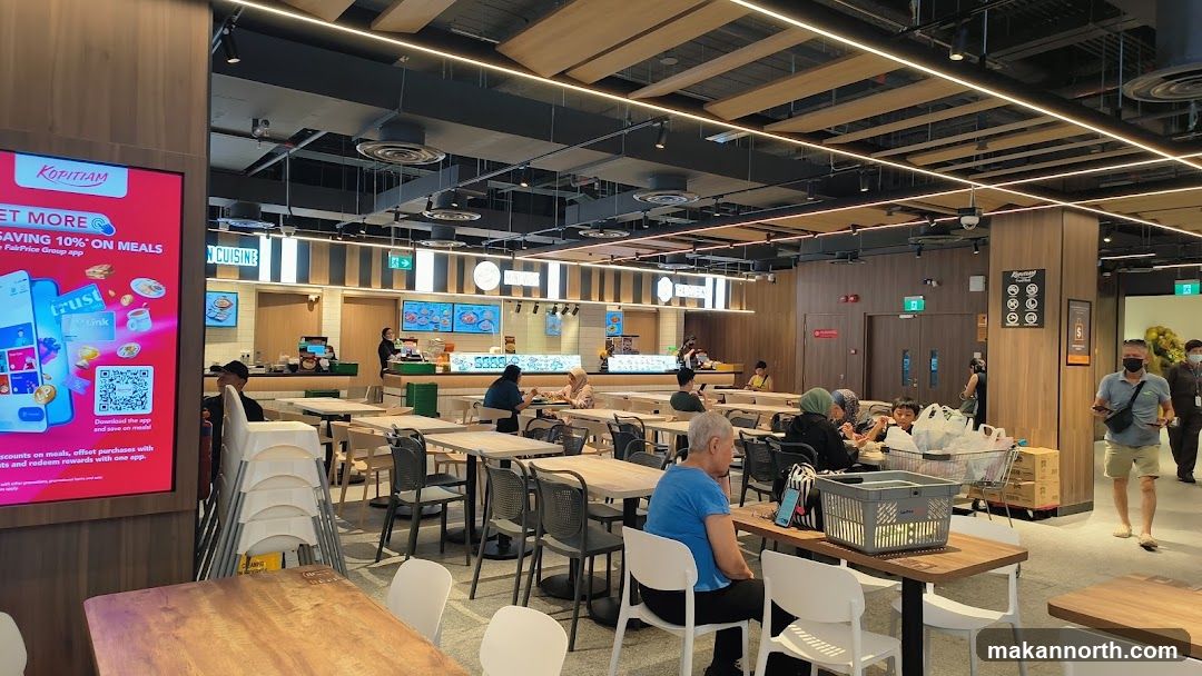 Food court with dining tables and food stalls