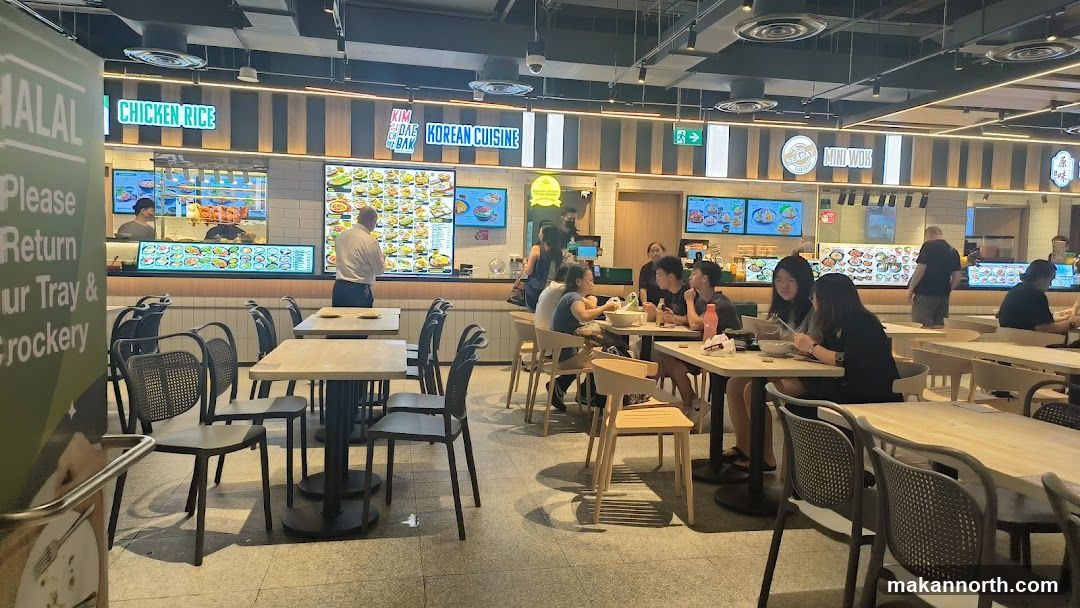 Food court with various stalls and seating