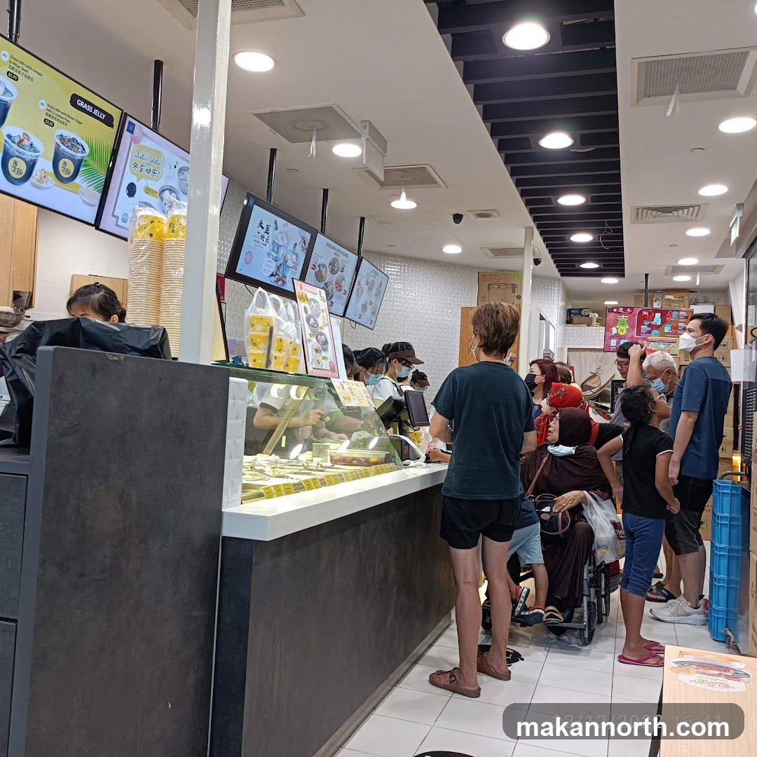 Dessert shop with a queue