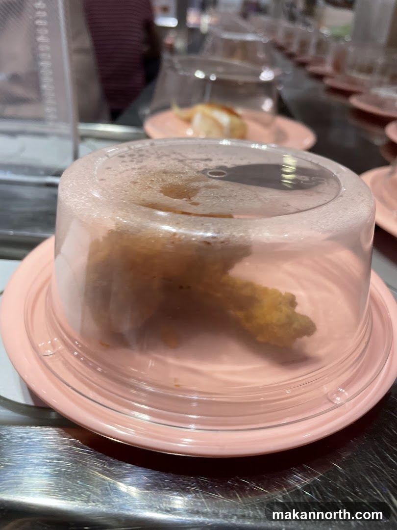 Fried Food on a Conveyor Belt