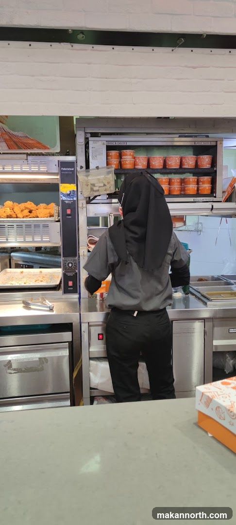 Kitchen Staff Preparing Food