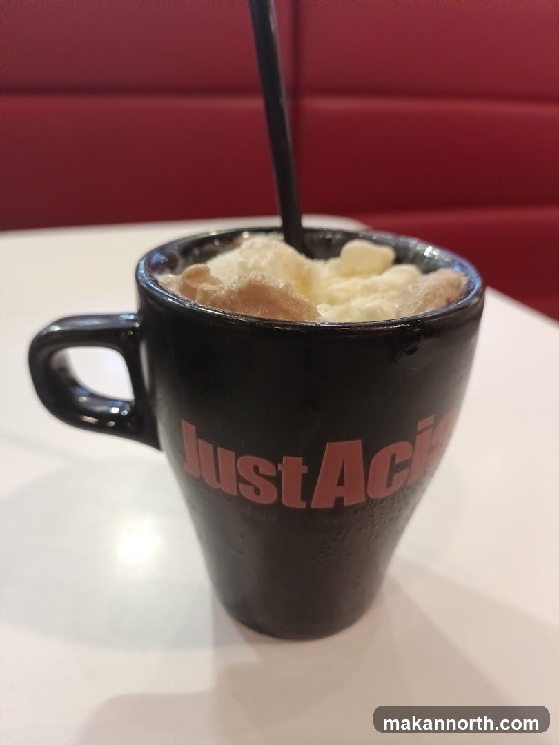 Beverage in a Black Mug