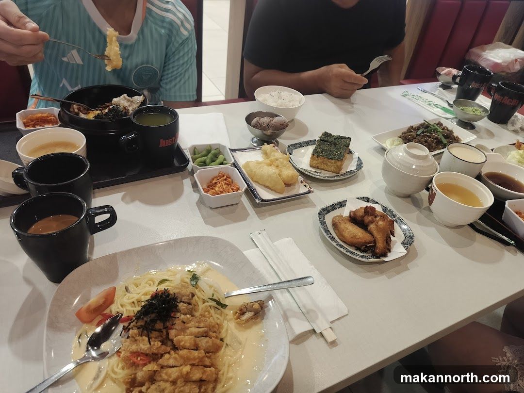 Table with various Japanese dishes