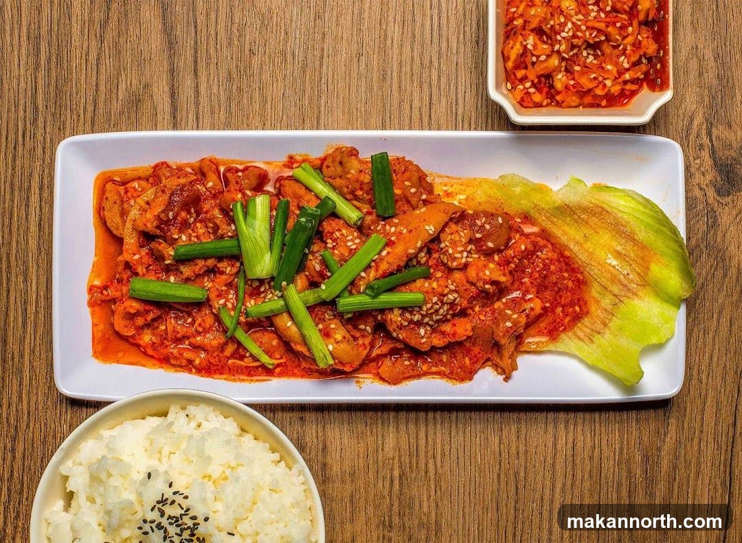 Spicy Pork Dish with Rice and Kimchi