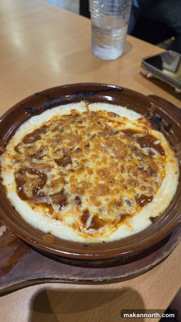 Baked Dish with Cheese and Sauce