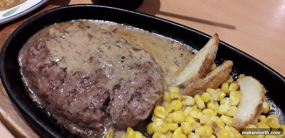 Hamburger Steak with Sauce, Corn, and Potato Wedges