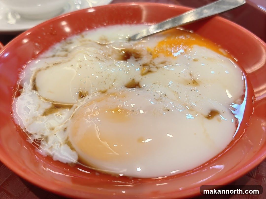 Soft-boiled eggs with soy sauce and pepper