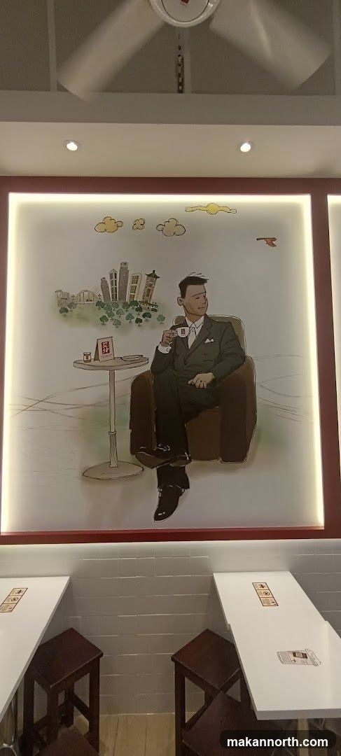 Man Enjoying Coffee in a Cafe