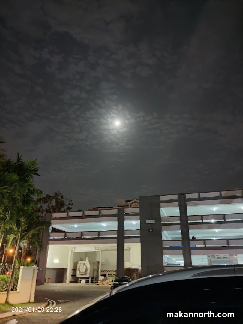 Moonlit building exterior at night