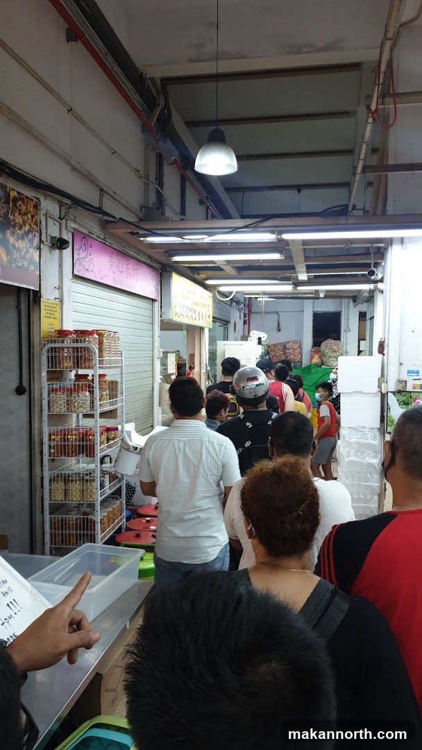 Market stall with a queue