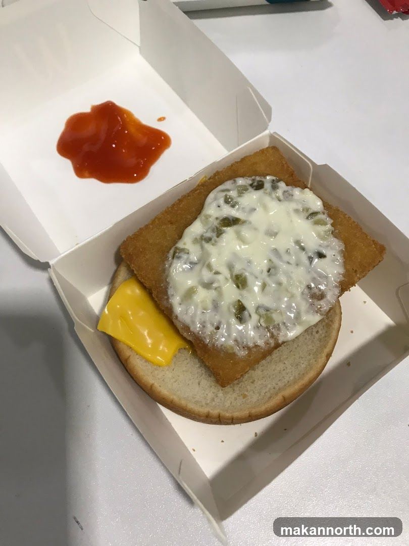 Fish Sandwich with Cheese and Sauce