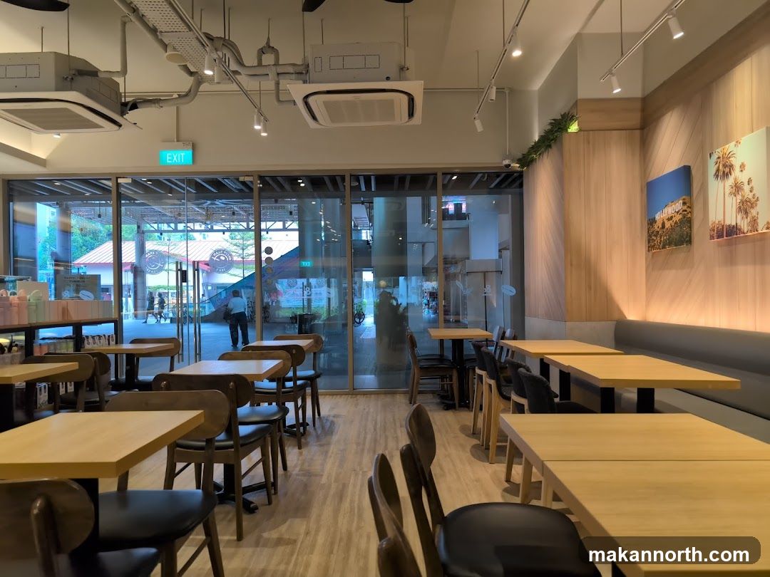 Cafe Interior with Wooden Tables and Chairs