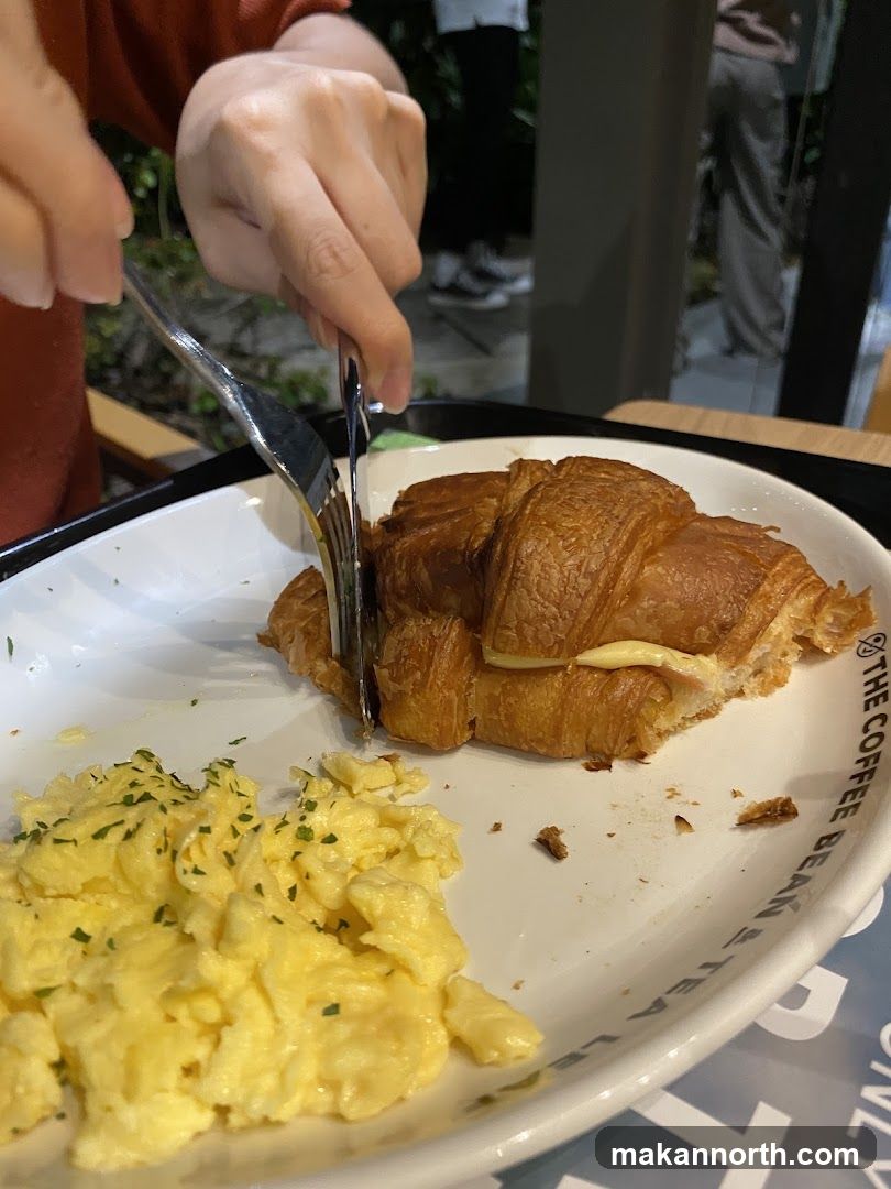 Croissant and Scrambled Eggs