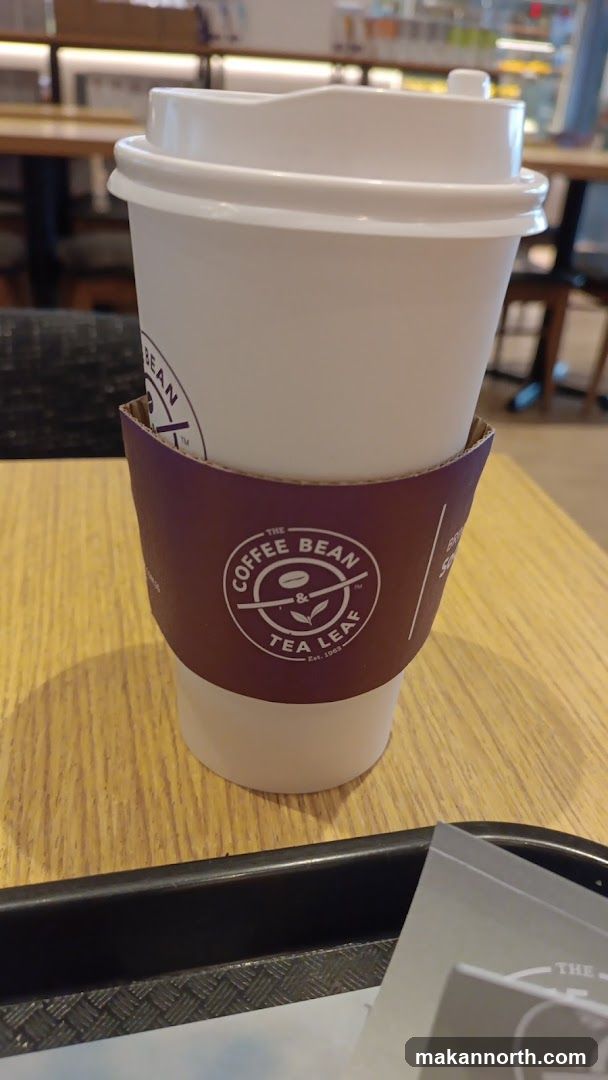Coffee cup with sleeve