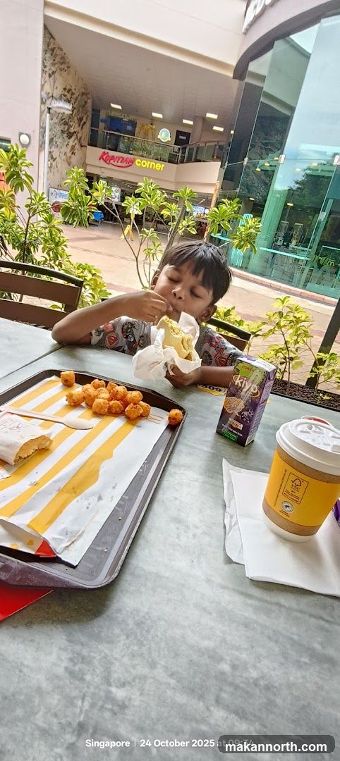Boy eating at a table