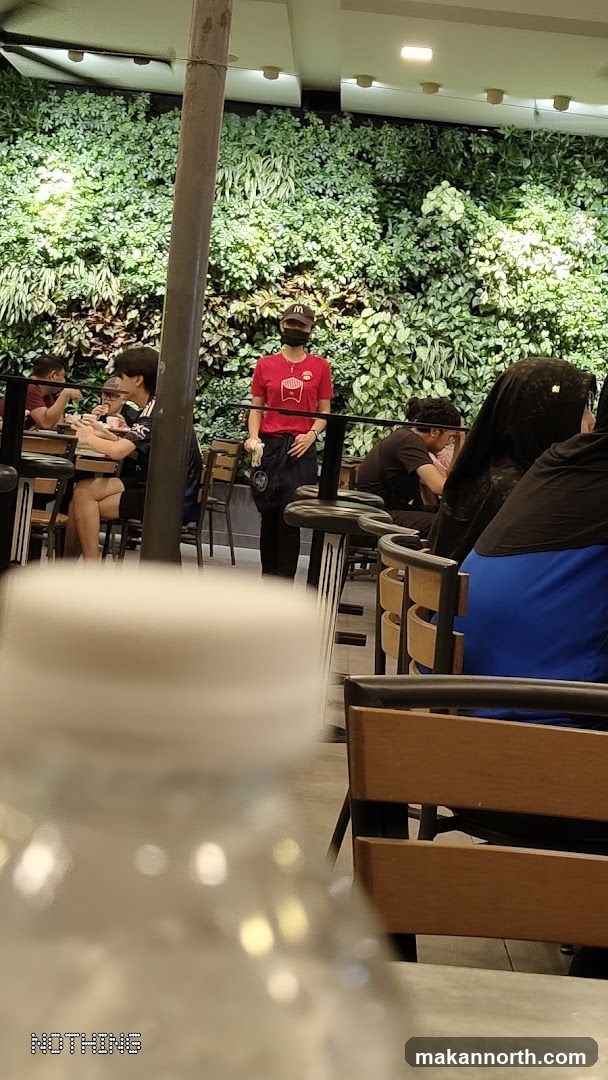 Restaurant Interior with Green Wall