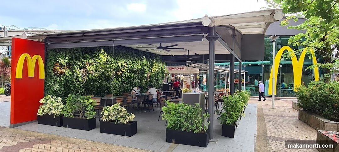 McDonald's Storefront with Green Wall
