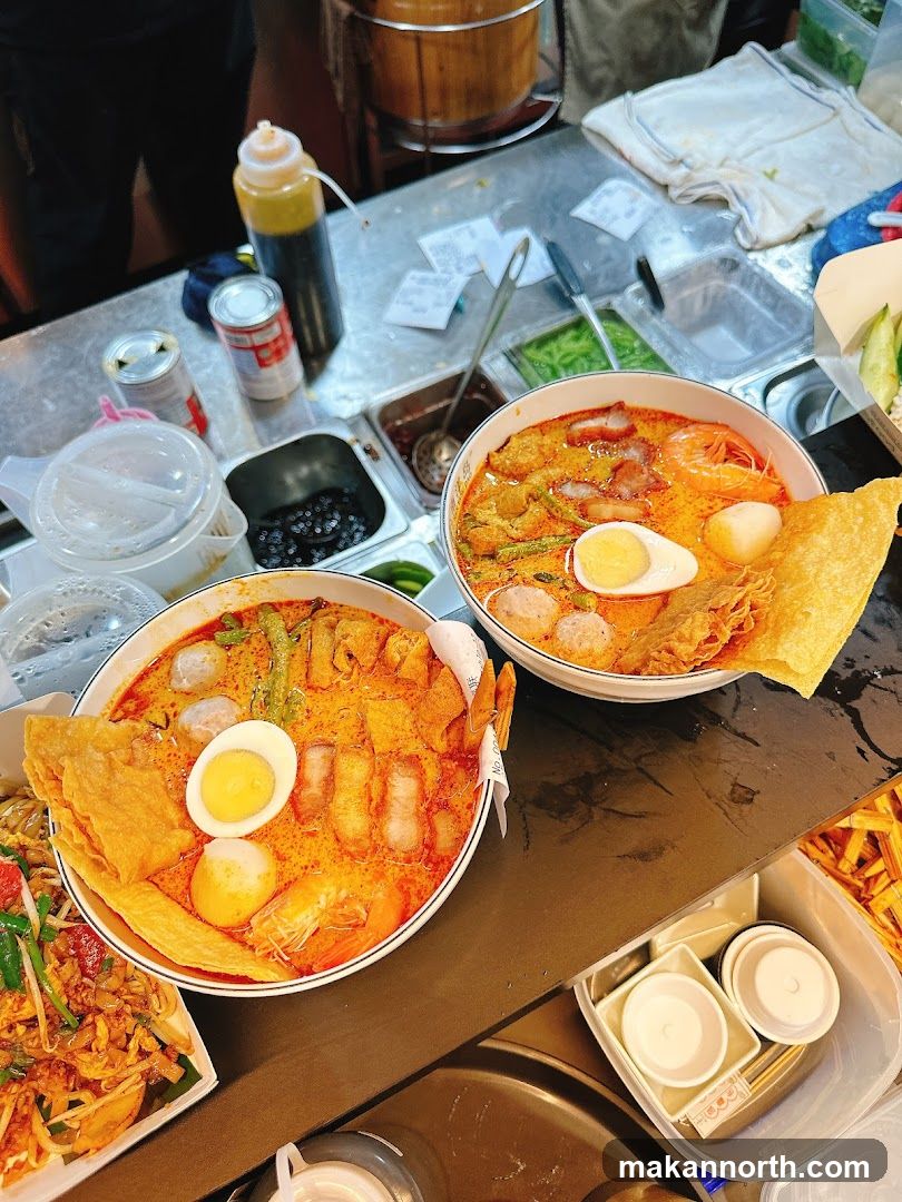 Two bowls of laksa