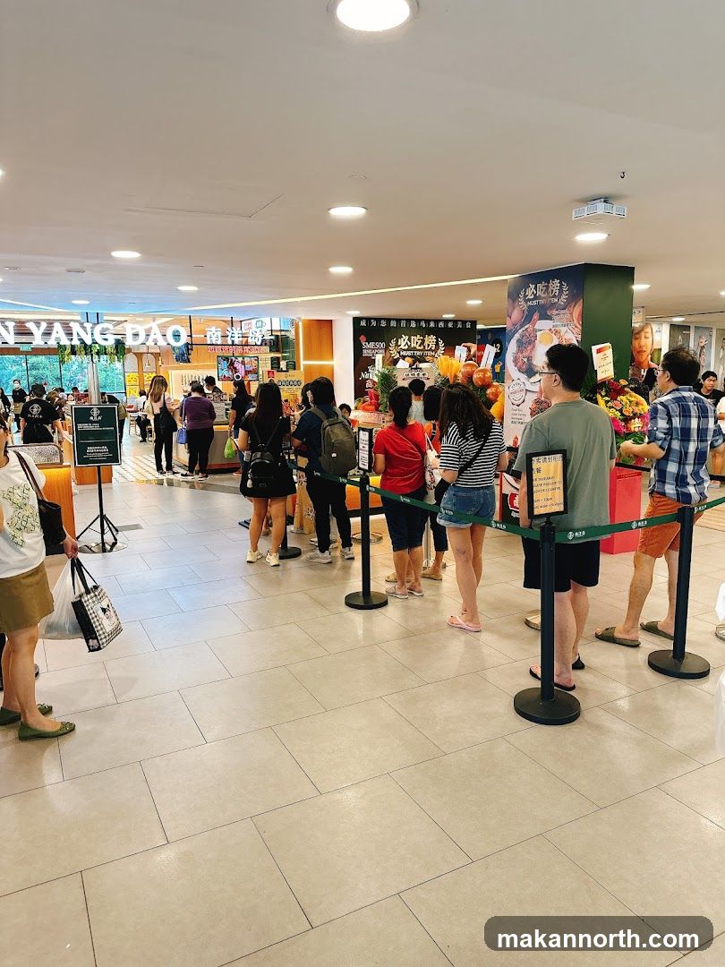 People queuing at a food stall