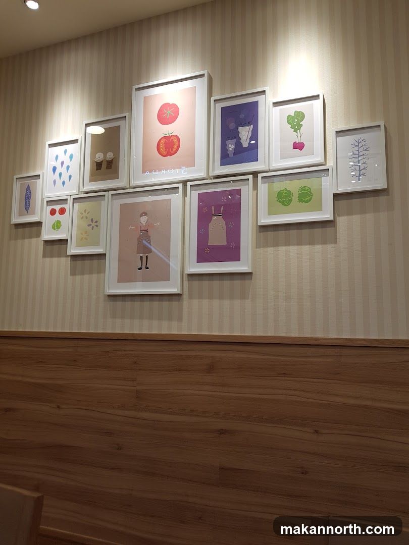 Framed Artwork on Striped Wall