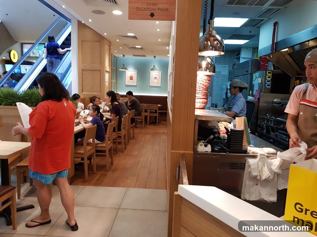 Restaurant Interior with Diners and Staff