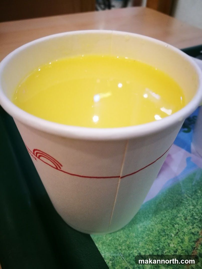 Yellow Drink in a Cup