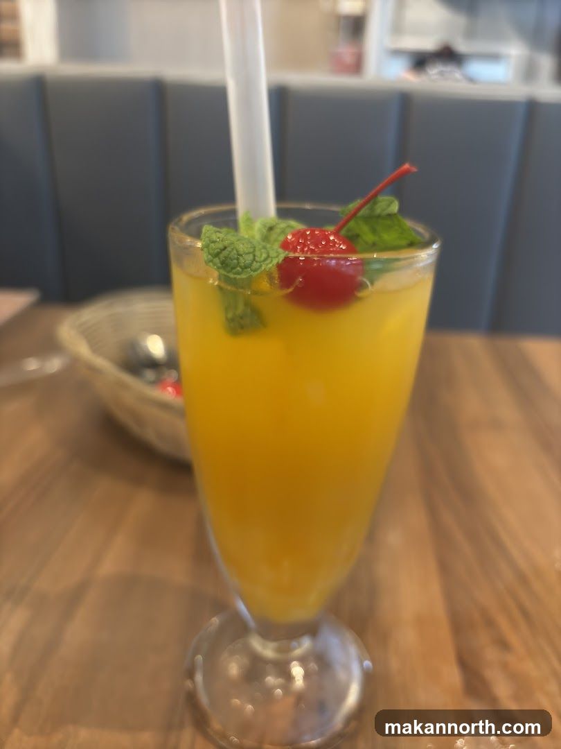 Orange Drink with Cherry and Mint