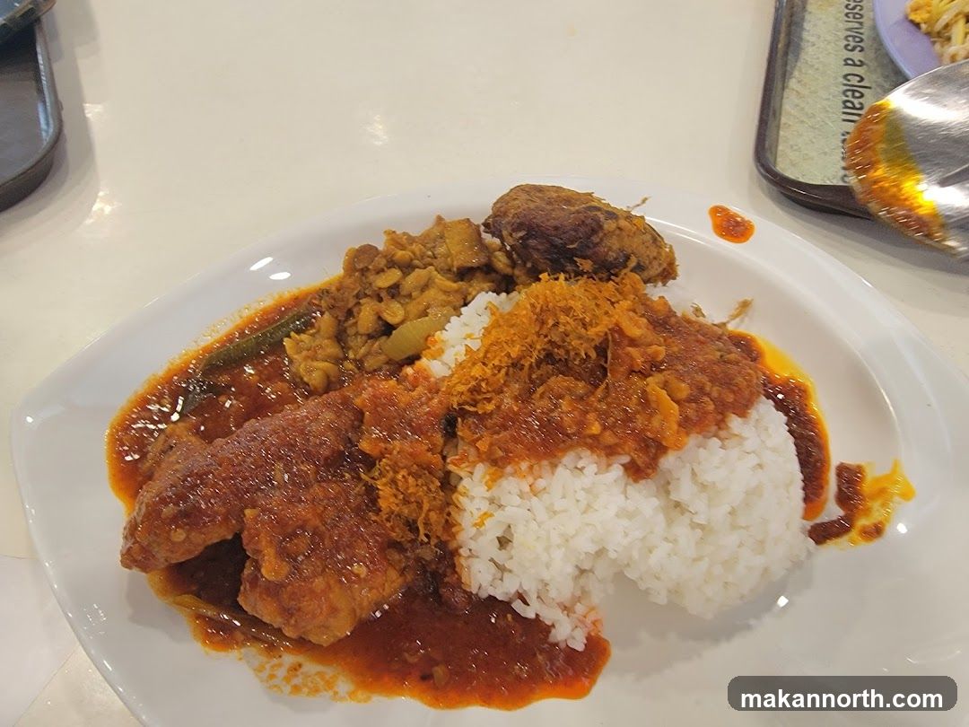 Plate of rice with various toppings