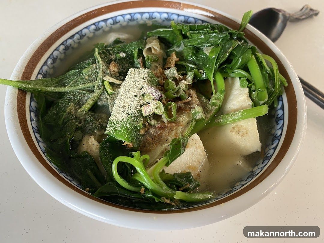 Bowl of Soup with Greens and Tofu