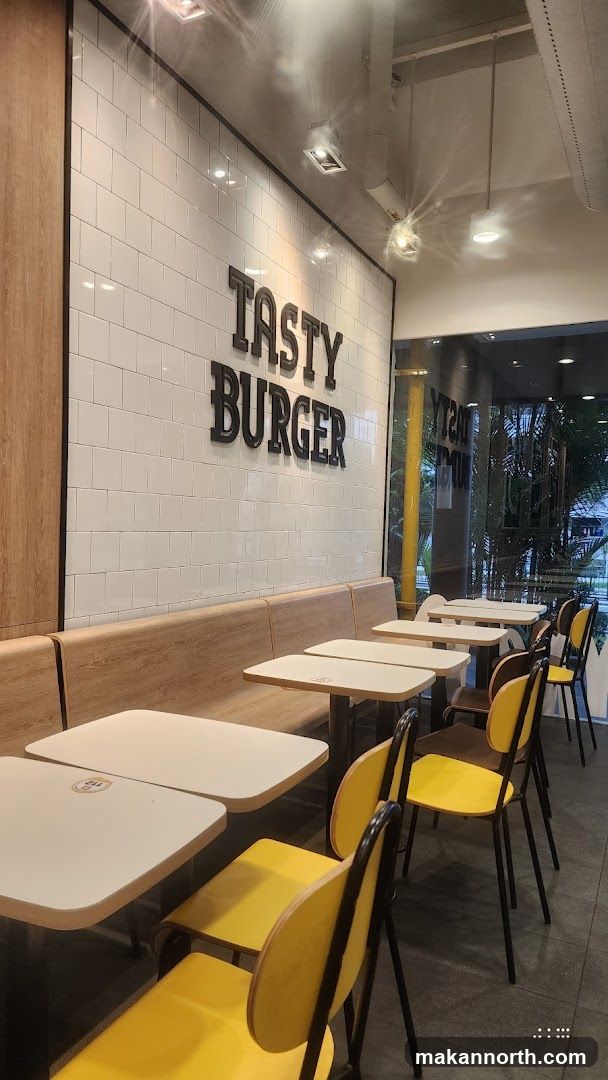 Restaurant Interior with "Tasty Burger" Sign