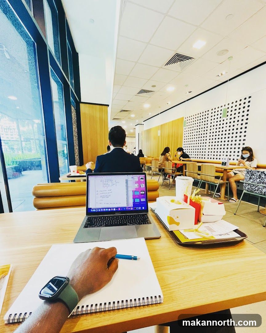Student studying at a fast-food restaurant