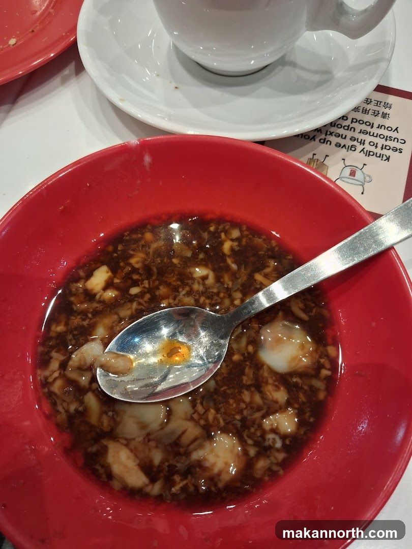 Bowl of Food with Spoon