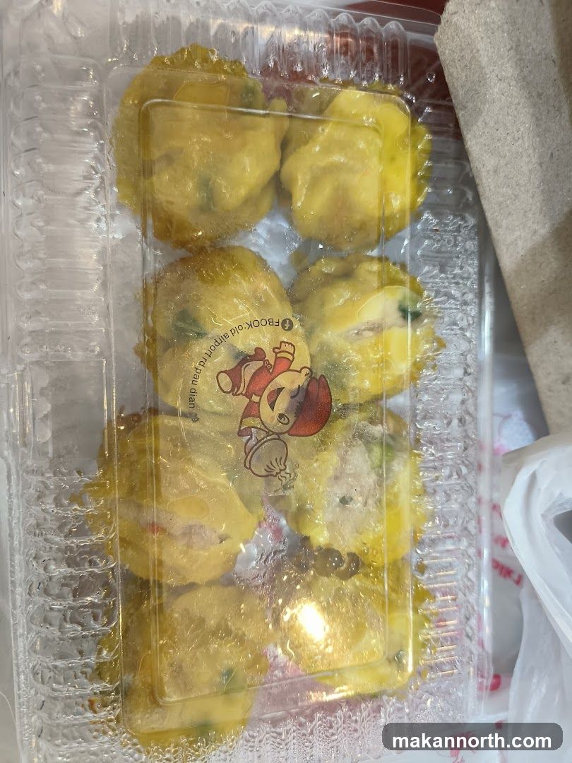Steamed Dumplings in a Plastic Container