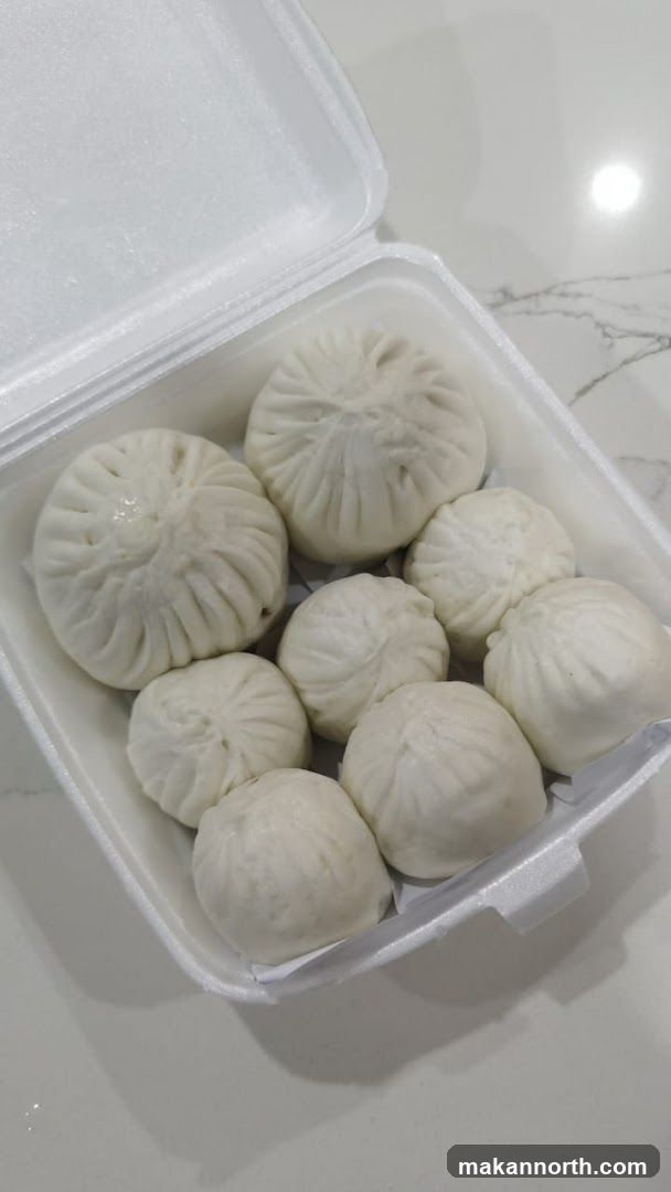 Steamed Buns in a Takeout Container