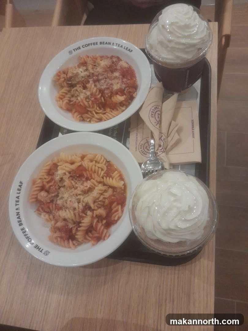 Two pasta dishes and two iced drinks