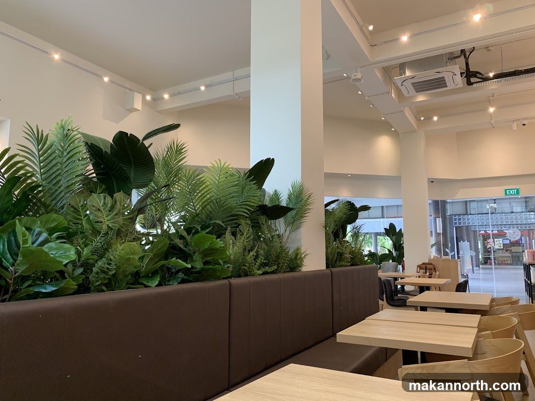 Cafe Interior with Lush Greenery