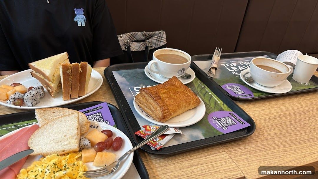 Breakfast spread with coffee and pastries